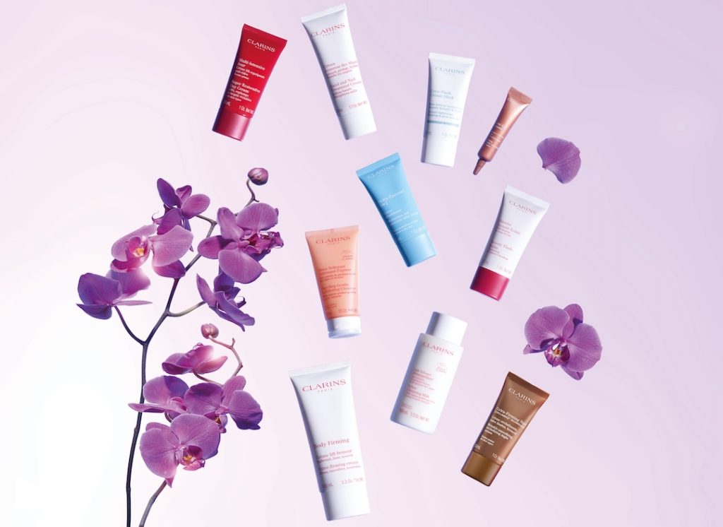 Clarins big beauty gift poster, your choice of 4 treats when you purchase 2 or more Clarins products, one to be skincare or foundation